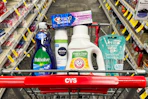 palmolive dish soap, crest toothpaste, nivea shave gel, arm & hammer detergent, and venus razors in a cart
