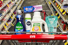 palmolive dish soap, crest toothpaste, nivea shave gel, arm & hammer detergent, and venus razors in a cart
