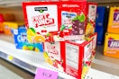 clover valley fruit punch juice boxes stacked on a shelf