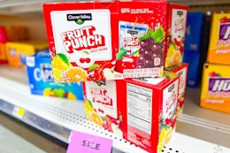clover valley fruit punch juice boxes stacked on a shelf