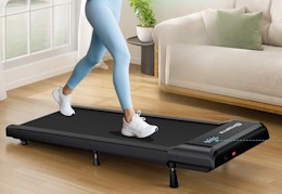 person walking on an inclined walking pad