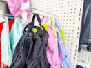 all in motion backpacks sitting on a target shelf
