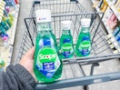 hand holding crest mouthwash in walgreens