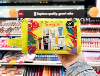 a hand holding up the sephora sun safety kit in store