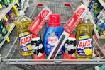 ajax dish soap, colgate toothpaste, gillette foamy, persil detergent, and kiss nail files in a cart