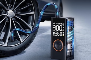 a tire inflator plugged into a tire