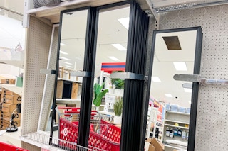 room essentials framed mirrors sitting on a target shelf