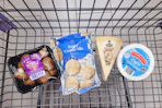mushrooms, cookie mix, parmesan cheese, and sour cream in a cart