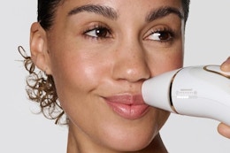 a woman using the braun ipl silk expert pro 5