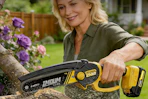 a woman using a chainsaw
