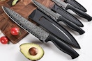 a kitchen knife set on a table