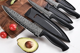 a kitchen knife set on a table