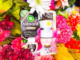 air wick vibrant starter kit placed on faux flowers at walmart