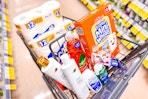 walgreens shopping cart filled with products including Dove and Scott and Crest