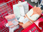 cloud island towels and washcloths sitting in a target cart