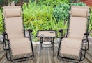 3-piece zero gravity chair and table set sitting on deck outside