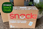 a frito lay snack box near an amazon box