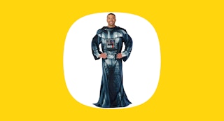 a man wearing a star wars throw blanket with sleeves