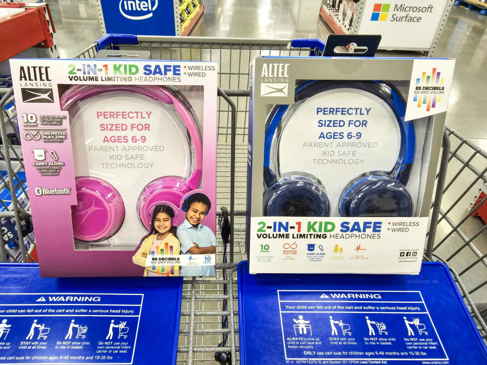2 pairs of kids headphones in a cart