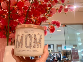 thank mom candle being held up