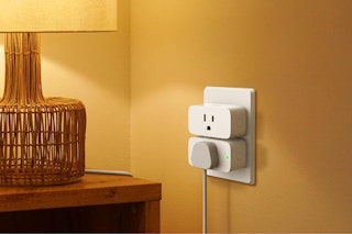 two smart plugs plugged into a wall