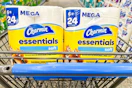 2 packs of charmin toilet paper in a cart