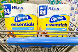 2 packs of charmin toilet paper in a cart