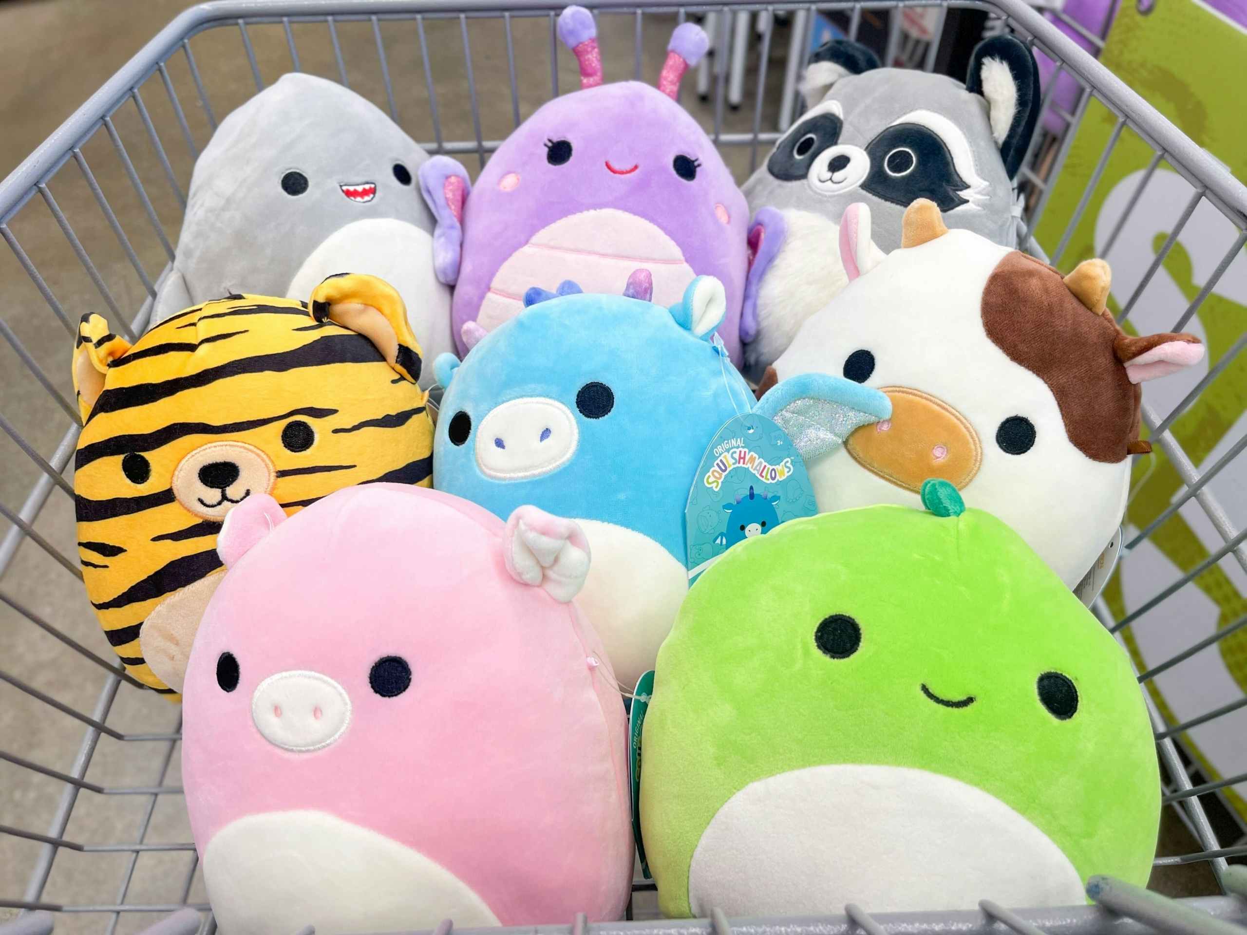 a bunch of squishmellow in a cart 