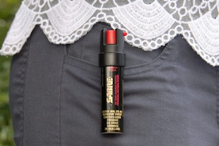Pepper spray clipped to a woman's pocket