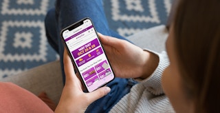 a person on the way fair website on their iphone