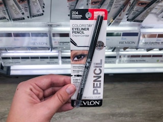 hand holding revlon colorstay eyeliner at target