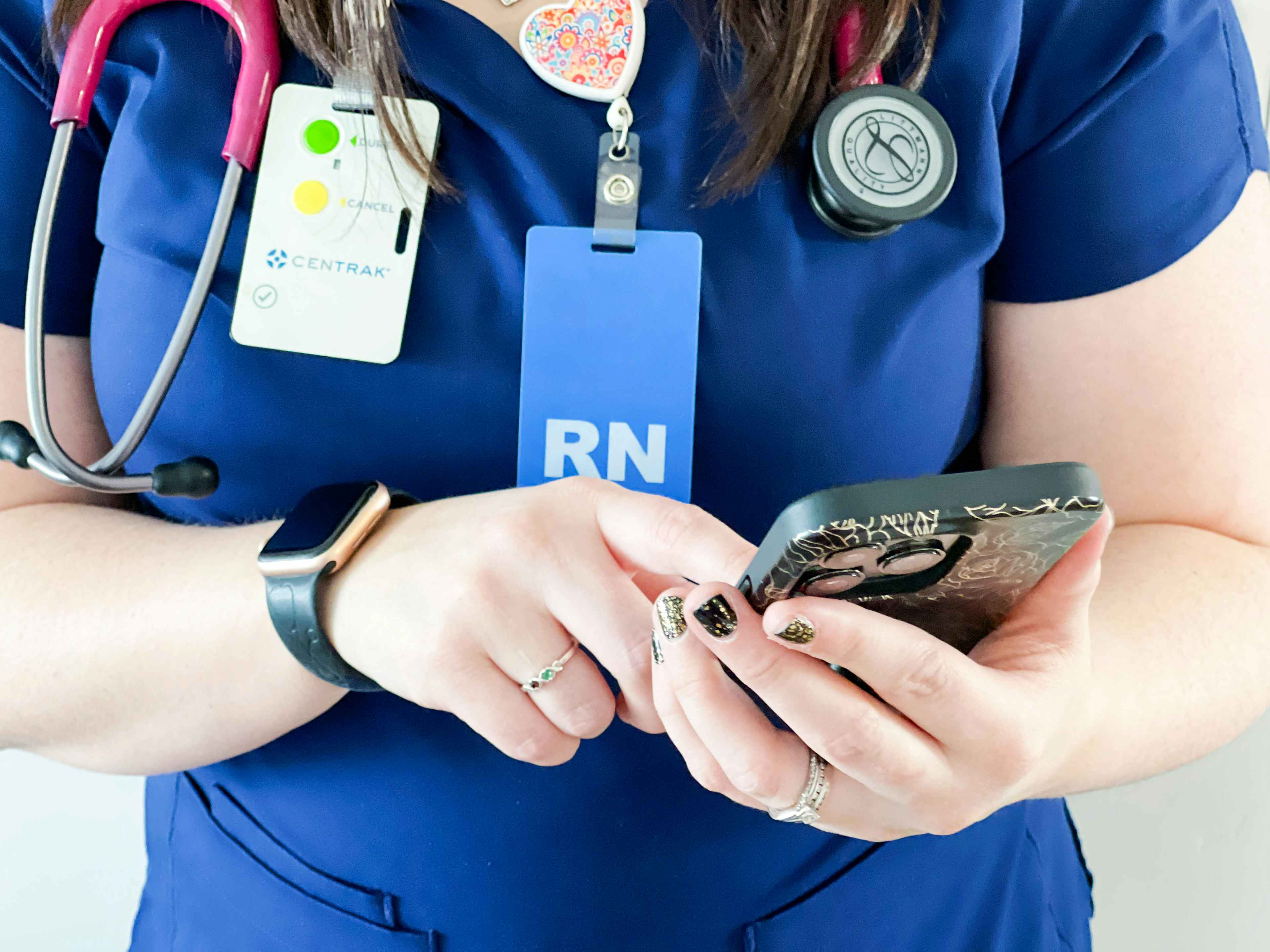 a nurse looking at her phone