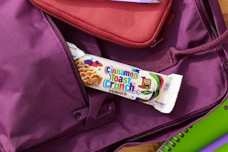Cinnamon Toast Crunch Treat Bars sticking out of bookbag
