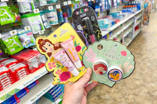 hand holding disney cosmetics at dollar tree