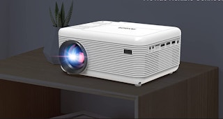 a white mini projector on a table