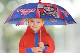 a child wearing nintendo super mario rain gear