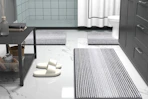 striped bathroom rugs on floor