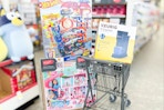 walgreens cart with barbie, keurig, and hotwheels products