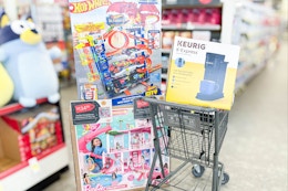walgreens cart with barbie, keurig, and hotwheels products