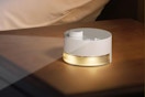 Portable White Noise Machine: 24 Soothing Sounds on a nightstand.