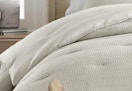 beige waffle textured comforter