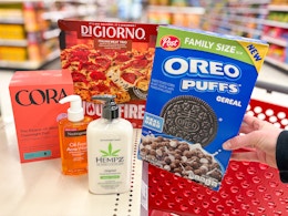 hand holding post oreo ceral with cora neutrogena hempz and digiorno on target shelf