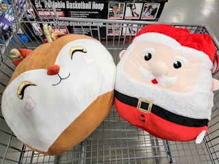 reindeer and santa jumbo squishy plushes in a cart