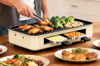 a man using an indoor grill