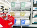 target cart parked in front of coop home goods bed pillows