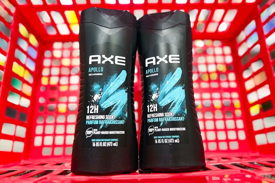 two bottles of axe body wash in a red shopping basket