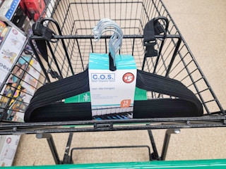 velvet hangers in a cart