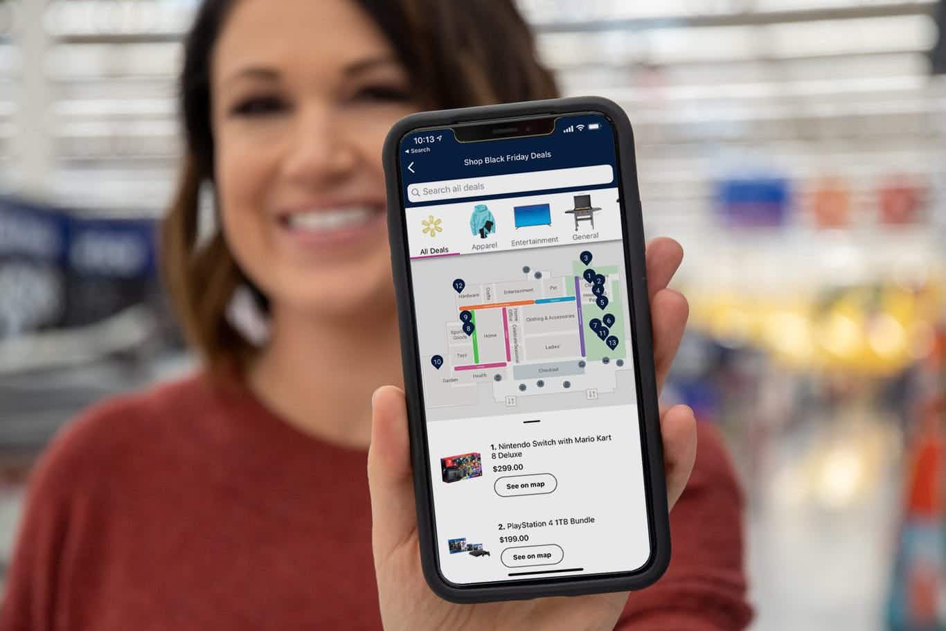 woman holding Walmart store map on phone
