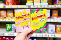 hand holding twostarburst duos drink mixes