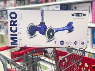 micro kickboar mini plus led scooter on a target cart